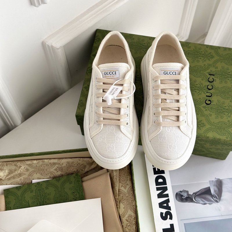 G*u*i sneakers